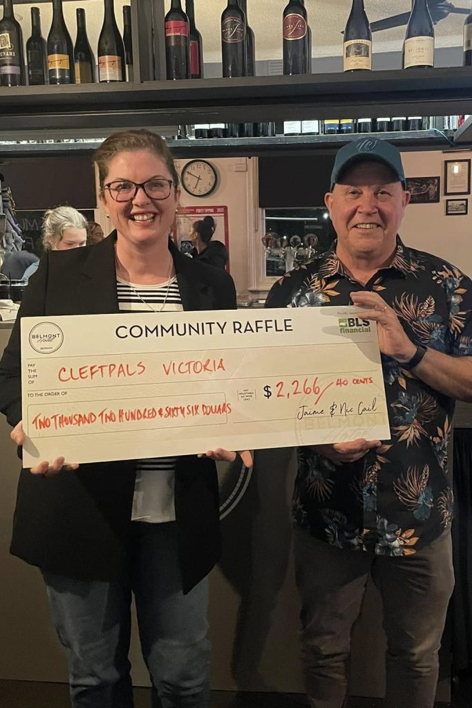 BLS Financial presenting a charity donation cheque to Cleft PALS